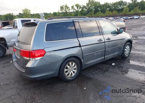 2010 Honda Odyssey Exl z USA, uszkodzony, nr VIN 5FNRL3H78AB015933